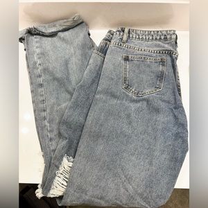 Light wash distressed boyfriend fit jeans